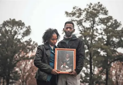  ?? ANDREA MORALES FOR MLK50. ?? Leanell “Troy” and Jeanette Mcclenton stand for a portrait near their home in West Memphis, Ark. Their son Duntate Young was working at the Fedex hub in Memphis when he was struck by a shipping container door. Fedex was fined $7,000 in connection with Young’s death.