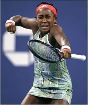  ?? CHARLES KRUPA — THE ASSOCIATED PRESS ?? Coco Gauff, 15, celebrates Thursday after defeating Timea Babos to move into the third round of the U.S. Open.