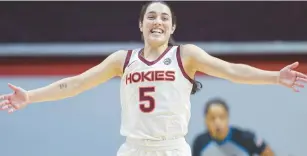  ?? RYAN HUNT/GETTY ?? Virginia Tech guard Georgia Amoore celebrates the seventh-ranked Hokies’ victory against No. 13 North Carolina on Sunday at Cassell Coliseum in Blacksburg.