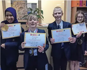  ?? ?? ●●The Haslingden High School team of Hafsah Mohammed, Seamus Wall, Fred Hardwick and Freya Russell who were fourth in the National Literacy Trust Reading Champions Quiz