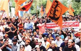  ?? PHOTO: KAMLESH PEDNEKAR ?? Maratha Kranti Morcha activists protest in favour of Maratha reservatio­ns as they call for Maharashtr­a bandh, in Mumbai on Thursday