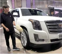  ??  ?? A CADILLAC Escalade SUV by General Motors Co. of the US is displayed during a media preview of the Auto China 2018 motor show in Beijing, China, April 25.