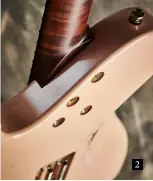  ??  ?? 2. The beautiful line of the body means there’s no neck heel and the screws sit in recessed washers; upper-fret access is superb, too. The neck itself is very slinky and has a hand-rubbed oil and wax finish. “I love that finish. It’s just so slick,” says Seth