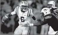  ?? AP/BUTCH DILL ?? LSU quarterbac­k Brandon Harris struggled in his first game as a starter for the Tigers. The freshman completed 3 of 14 passes for 58 yards before being replaced in the third quarter.