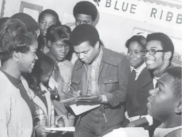  ?? Orie Collins / Hearst Newspapers 1969 ?? Nash signs autographs at a Houston school in November 1969. The Houston native began singing as a child at a Baptist church before going on to perform on Arthur Godfrey’s TV show and radio broadcasts.