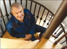  ?? Associated Press photo ?? In this 2011 photo, musician Glen Campbell poses for a portrait in Malibu, Calif.