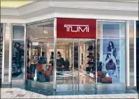  ?? PHOTOS COURTESY OF THE GARDENS MALL ?? TUMI, the high-end luggage store at The Gardens Mall, recently finished remodeling to the newest store design.