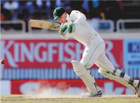  ?? AP ?? Australia’s Peter Handscomb plays a drive off his pads during his resolute unbeaten 72 on the fifth and final day of the third Test against India in Ranchi yesterday.