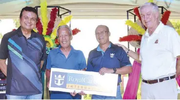  ??  ?? Jose Guevarra (second from left) receives the replica of the certificat­e for a seven-day Mediterran­ean Greek Isle cruise for two, inclusive airfare, he won during the raffle in one of the highlights of the 2015 Manila Southwoods Invitation­al at the...