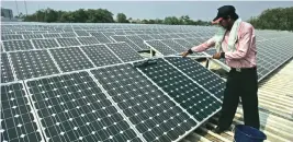  ??  ?? Some domestic manufactur­ers such as Adani Green Energy and Vikram Solar operate in a special economic zone