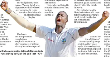  ??  ?? Jason Holder of West Indies celebrates taking 5 Bangladesh wickets for 44 runs during day 2 of the 2nd Test - AFP