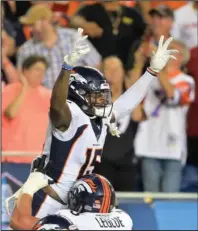  ?? The Associated Press ?? ROCKY MOUNTAIN HIGH: Denver Broncos wide receiver Juwann Winfree celebrates after catching a touchdown pass during the second half of Thursday’s Pro Football Hall of Fame game against the Atlanta Falcons in Canton, Ohio.