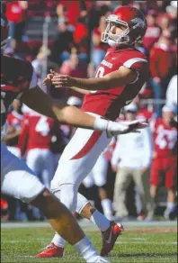  ?? The Associated Press ?? IT’S GOOD: Arkansas kicker Connor Limpert kicks a 55-yard field goal against Vanderbilt on Saturday during the third quarter of the Razorbacks’ 45-31 loss to the Commodores at Donald W. Reynolds Razorback Stadium in Fayettevil­le.