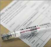  ?? Melissa Phillip Houston Chronicle ?? THE SUPPLY of vaccines is improving, officials say. Above, a dose of Moderna’s COVID-19 vaccine.