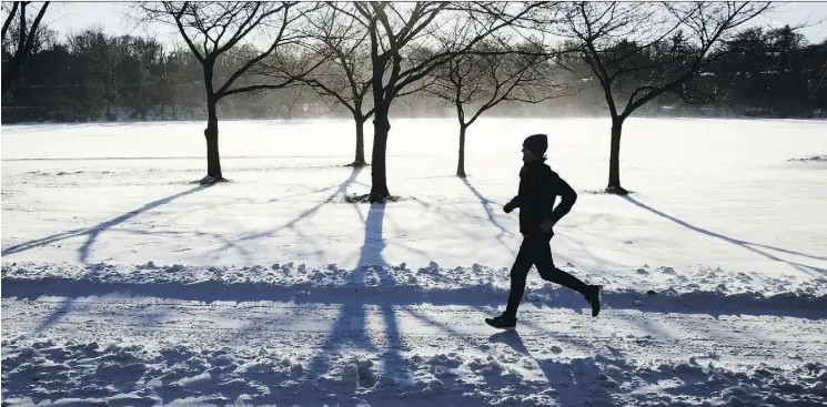  ?? MATT ROURKE/THE ASSOCIATED PRESS ?? One difference between runners and non-runners is the willingnes­s to find time to exercise, a study suggests.
