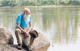  ?? STEVEN SENNE/AP 2021 ?? David Lidstone, known to locals as“River Dave,”had been living for almost three decades in a cabin in the woods along the Merrimack River in Canterbury, N.H.