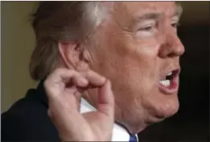  ??  ?? President Donald Trump speaks during a bill signing event in the East Room of the White House on Friday in Washington. AP PHOTO