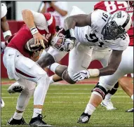  ?? Arkansas Democrat-Gazette/MITCHELL PE MASILUN ?? Arkansas quarterbac­k Austin Allen takes a hit against TCU. Although Allen has struggled, Razorbacks Coach Bret Bielema said he still has confidence in his senior quarterbac­k. “It’s still the same kid that can really throw the football,” Bielema said.