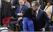  ?? SUSAN WALSH — THE ASSOCIATED PRESS ?? Supreme Court nominee Judge Ketanji Brown Jackson gets a kiss from her husband, Dr. Patrick Jackson, at the conclusion of her confirmati­on hearing before the Senate Judiciary Committee on Capitol Hill in Washington on Wednesday.