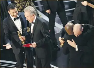  ?? Robert Gauthier Los Angeles Times ?? JIMMY KIMMEL, left, jokingly asks presenter Warren Beatty, “What did you do” after “La La Land” was mistakenly announced as best picture. “Moonlight” was the actual winner.