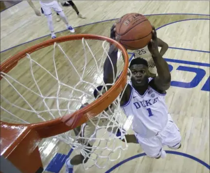  ?? CHUCK BURTON — THE ASSOCIATED PRESS ?? Duke’s Zion Williamson dunks against Florida State on March 16 in Charlotte, N.C.