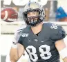  ?? STEPHEN M. DOWELL/ ORLANDO SENTINEL ?? UCF tight end Jake Hescock celebrates after a touchdown in 2019.