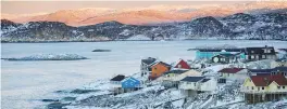  ??  ?? The town of Ilulissat in Greenland. A crater has been found under the ■ Hiawatha Glacier at Greenland’s north-west tip.