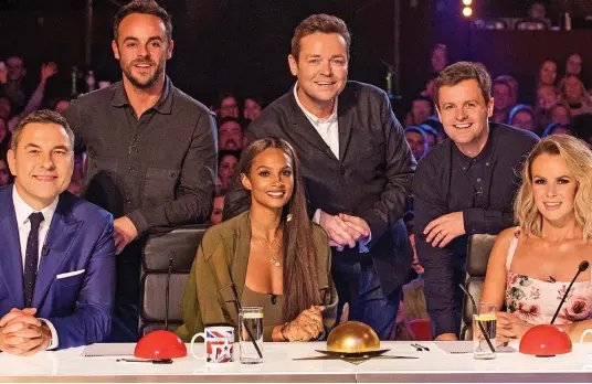  ??  ?? Cashing in: The stars of ITV’s Britain’s Got Talent. David Walliams, left, has been criticised for promoting TV-based gaming