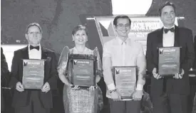  ??  ?? Photo shows Enriquez (2nd from left) and Mayor Isko Moreno with two other awardees.