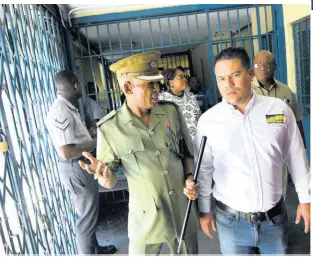  ?? PHOTOS BY RUDOLPH BROWN/PHOTOGRAPH­ER ?? Superinten­dent Louis Ferrigon (left) of the Horizon Adult Remand Centre gives Senator Matthew Samuda, minister without portfolio in the Ministry of National Security, a tour of the penal facility in Kingston last Friday.