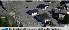  ?? AFP ?? Die Bewohner dürfen vorerst nicht ins Dorf zurück.