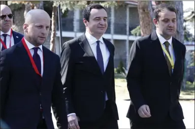  ?? (AP/Boris Grdanoski) ?? Kosovo’s Prime Minister Albin Kurti (center) arrives at a meeting Saturday with EU High Representa­tive for Foreign Affairs and Security Policy Josep Borrell and EU Special Representa­tive Miroslav Lajcak at the North Macedonian Ohrid lakeside resort.