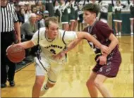  ?? STAN HUDY - SHUDY@DIGITALFIR­STMEDIA.COM ?? Greenwich junior Carson Mosher looks to get around Stillwater junior Cooper Monast Tuesday night in Class C playoff action at Greenwich High Schoo. Feb. 20, 2018