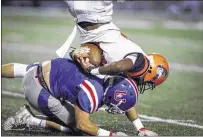  ??  ?? Ridgeway running back Cameron Stansbury flips over Memphis University School defender Buchanan Dunavant in the second quarter. A full roundup of Friday night’s prep football action is available online at
A recap of Friday night’s games and statistics...