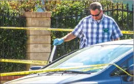  ?? Austin Dave/The Signal ?? Detective Bill Velek with the Santa Clarita Valley Sheriff’s Station searches a vehicle at the scene of a suspected fatal drug overdose.