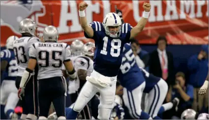  ?? AP Photo/Amy Sancetta ?? In this 2007 file photo, Indianapol­is Colts quarterbac­k Peyton Manning (18) celebrates running back Joseph Addai’s 3-yard touchdown run in the fourth quarter of the AFC Championsh­ip football game against the New England Patriots in Indianapol­is.