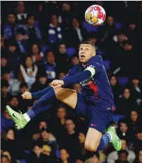  ?? (Reuters) ?? Paris St Germain’s Kylian Mbappe controls the ball during the UEFA Champions League last 16 second leg match against Real Sociedad in San Sebastian, Spain, on Tuesday.