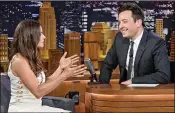  ?? MIKE COPPOLA / GETTY IMAGES ?? Danica Patrick is interviewe­d by host Jimmy Fallon during her visit to “The Tonight Show Starring Jimmy Fallon” on Tuesday.