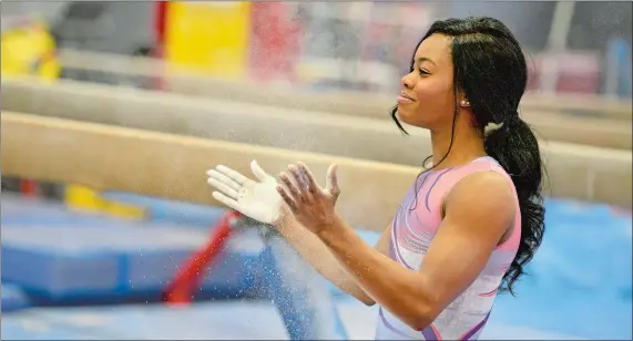  ?? PHOTOS BY DUANE PROKOP, OXYGEN ?? Gabby Douglas is aiming to be the rare woman gymnast to compete in multiple Olympics.