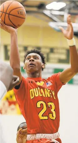  ?? COLBY WARE/FOR BALTIMORE SUN MEDIA ?? Former Dulaney sharpshoot­er Ike Cornish goes up strong against Milford Mill in 2019.
