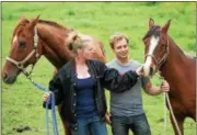  ?? KRISTI GARABRANDT — THE NEWS-HERALD ?? U.S. Marine veteran Jason Campbell works at the stables owned by fiancee Lindsay Holland after trying to get his life back on track and learn horsemansh­ip.