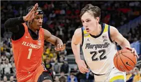  ?? Aaron Gash / Associated Press ?? Marquette's Tyler Kolek drives to the basket against Illinois' Trent Frazier. Kolek converted a steal into a go-ahead layup with 18 seconds left to win.