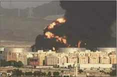  ?? Hassan Ammar / Associated Press ?? Plumes of smoke rise from a burning oil depot after an attack by Yemen's Houthi rebels ahead of a Formula One race in Jiddah, Saudi Arabia, on March 25. Whether trying to find jobs for a growing number of unemployed youth or finding a way to end the long war he launched in Yemen against the Houthis, Crown Prince Mohammed bin Salman and his father King Salman now face a potential pivot point for the kingdom amid Russia's war on Ukraine.