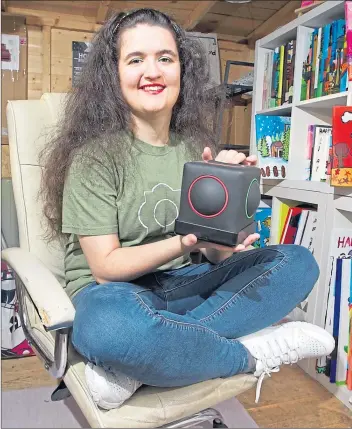 ?? Picture
Chris Austin ?? Sam Ruderham with her Skoog designed to encourage disabled children to create their own music