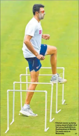  ??  ?? R Ashwin warms-up during training ahead of India’s first Test versus South Africa in Visakhapat­nam on Monday. The match starts on Wednesday.
AFP