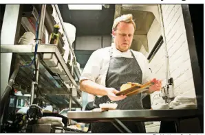  ?? The Washington Post file photo ?? Tony Chittum, executive chef at Iron Gate Restaurant in Washington, admits that some whimsy has found its way into his menu writing.