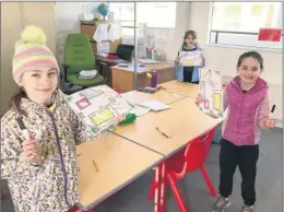  ??  ?? READY TO GO - Glenroe CNS pupils Rebecca McCarthy Sherwood, Aoife McSweeney and Mollie Mansell ready to search for those hidden Easter eggs.