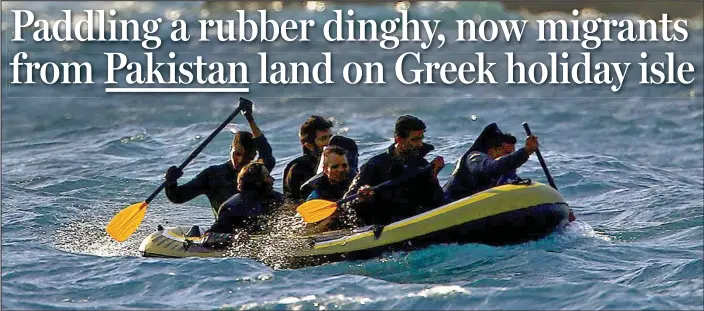  ??  ?? Dangerous: Eight migrants crossing from the Turkish mainland to Kos desperatel­y try to keep their dinghy from sinking before they can reach the safety of the island’s shores