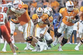  ?? Randy Sartin-USA TODAY Sports ?? Tennessee Volunteers running back Jabari Small (2) runs the ball against the Bowling Green Falcons during the second half at Neyland Stadium on Sept. 2 in Knoxville.