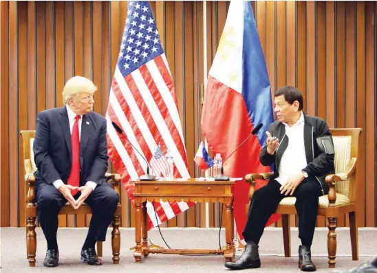  ?? (Ali Vicoy) ?? US President Donald Trump and President Duterte hold a bilateral meeting on the sidelines of the 31st Associatio­n of Southeast Asian Nations Summit and Related Meetings at the Philippine Internatio­nal Convention Center in Pasay City.